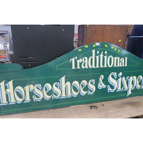 572 - A MODERN FOLDING PAINTED WOOD FAIRGROUND SIGN, inscribed 'Traditional, Horseshoes and Sixpences', gr... 