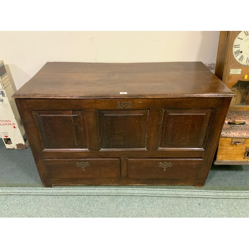 702 - An antique oak mule chest with two drawers below, W 120 cm