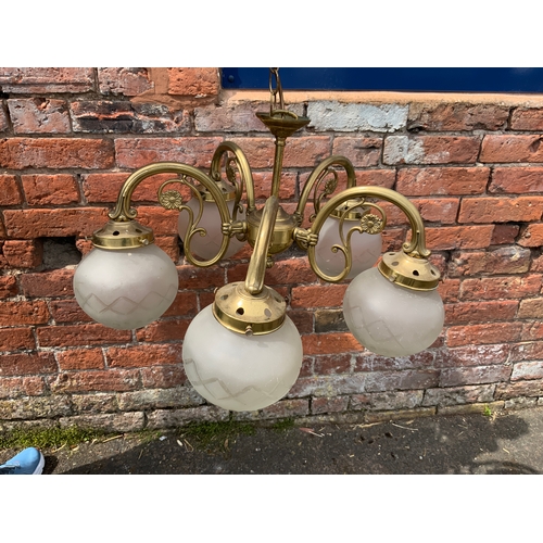 711 - Three early 20th century chandelier light fittings with etched and moulded decoration