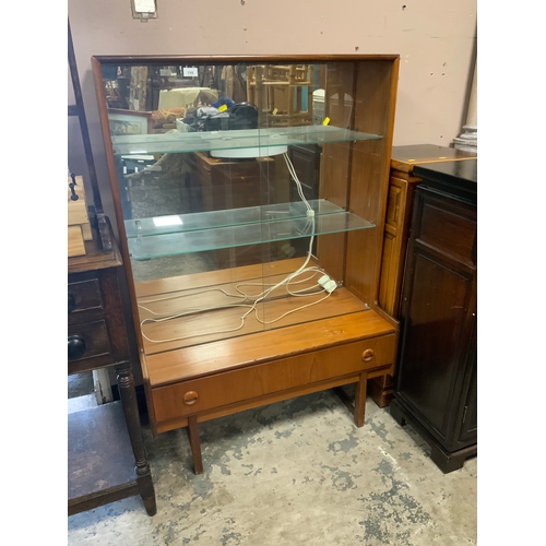 715 - A mid-century teak glazed bookcase with single draw below W 91 cm