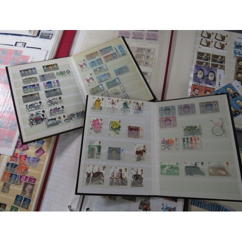 99 - TWENTY BRITISH STAMP ALBUMS / STOCK BOOKS, to include many QEII blocks