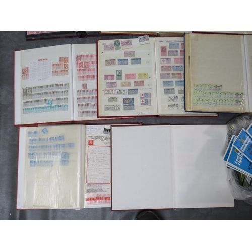 115 - TWO BOXES CONTAINING TWENTY BRITISH STAMP ALBUMS AND STOCK BOOKS, together with loose British stamps