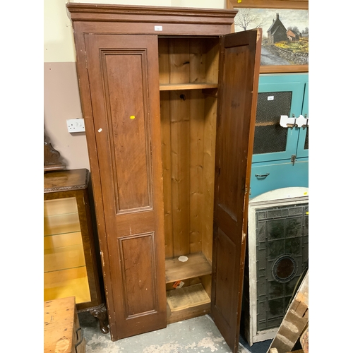 726 - A vintage tall, two door 19th century school style cupboard H 212 cm