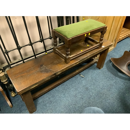 730 - A heavy oak trestle style bench together with an oak stool with a upholstered top