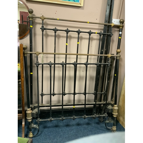 731 - A Victorian brass and cast single bed frame with stretchers