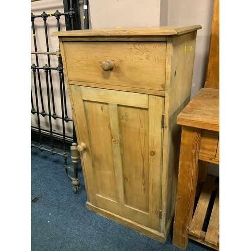 733 - An old pine, single door cupboard with drawer above H 122 cm W 64 cm