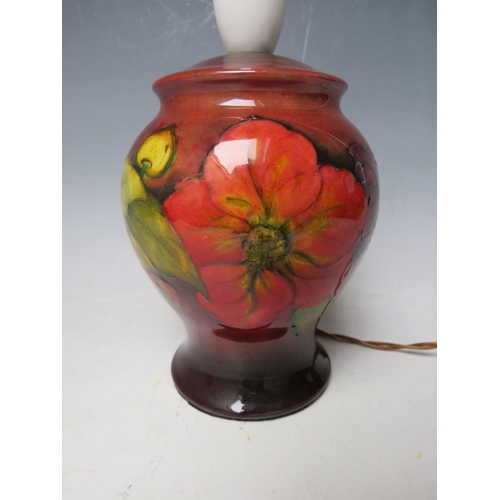 306 - A MOORCROFT FLAMBE ORCHID PATTERN TABLE LAMP, H 15 cm (excl. fitting)