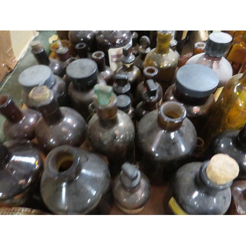 151 - TWO TRAYS OF BROWN AND AMBER CHEMIST AND LABELLED APOTHECARY BOTTLES ETC