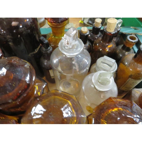 151 - TWO TRAYS OF BROWN AND AMBER CHEMIST AND LABELLED APOTHECARY BOTTLES ETC