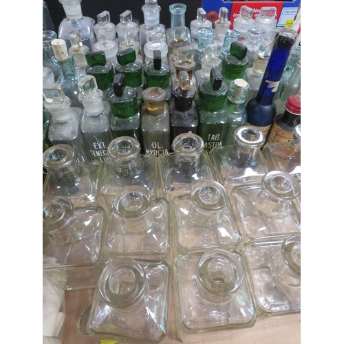 165 - TWO TRAYS OF ASSORTED CHEMISTS BOTTLES ETC TO INCLUDE VINTAGE CANISTERS ETC