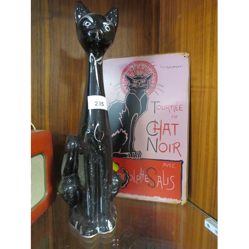 235 - A VINTAGE BLACK CERAMIC CAT TOGETHER WITH A REPRODUCTION TOURNEE DU CHAT NOIR ENAMEL SIGN