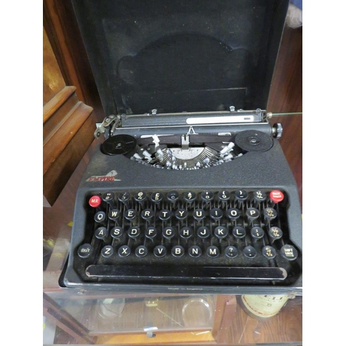 237 - A VINTAGE EMPIRE PORTABLE TYPEWRITER