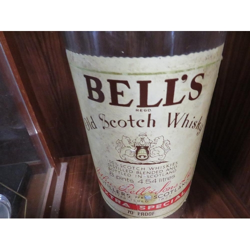 241 - A LARGE EMPTY BELLS SCOTCH WHISKY BOTTLE