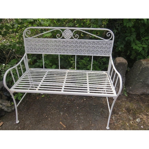 603 - A WROUGHT IRON GARDEN BENCH