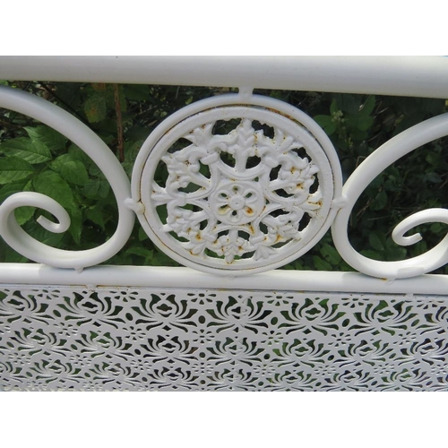 603 - A WROUGHT IRON GARDEN BENCH