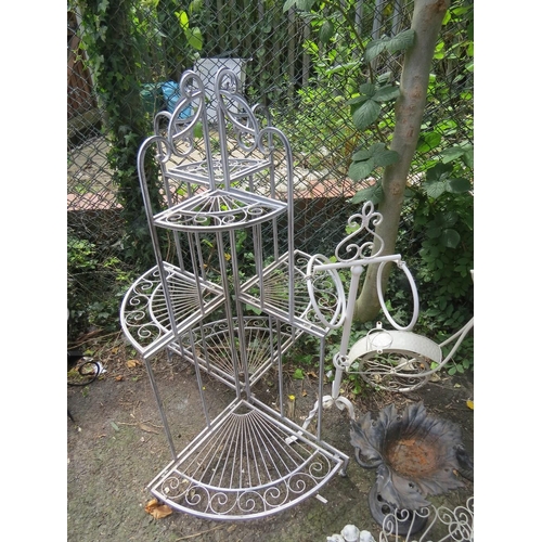 605 - A SELECTION OF WROUGHT IRON AND CAST GARDEN GARDEN ORNAMENTS TO INCLUDE A BIKE PLANTER