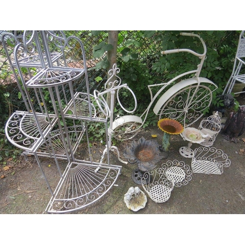 605 - A SELECTION OF WROUGHT IRON AND CAST GARDEN GARDEN ORNAMENTS TO INCLUDE A BIKE PLANTER