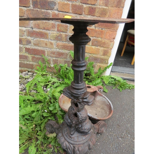 613 - A CAST IRON TABLE PEDESTAL LEG, TOGETHER WITH A TROUGH/ PLANTER