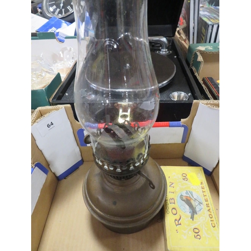 64 - A VINTAGE PARAFFIN LAMP TOGETHER WITH A BOOK OF FIRST DAY COVERS ETC