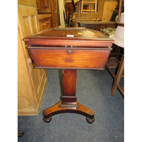 734 - A 19TH CENTURY MAHOGANY TEAPOY ON TRIPOD STAND