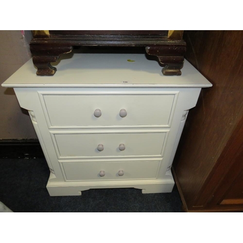 746 - A WHITE PAINTED THREE DRAWER CHEST TOGETHER WITH A FAUX LEATHER STYLE CABINET (2)