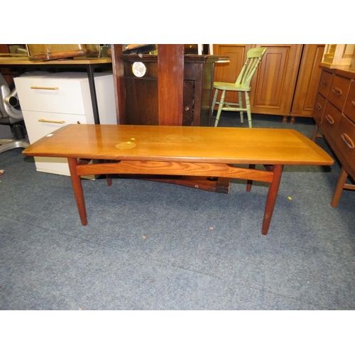 751 - A teak mid-century coffee table with staining to the top