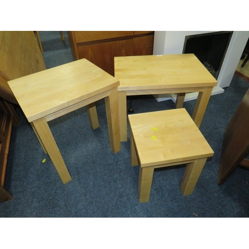 752 - A modern oak nest of three tables