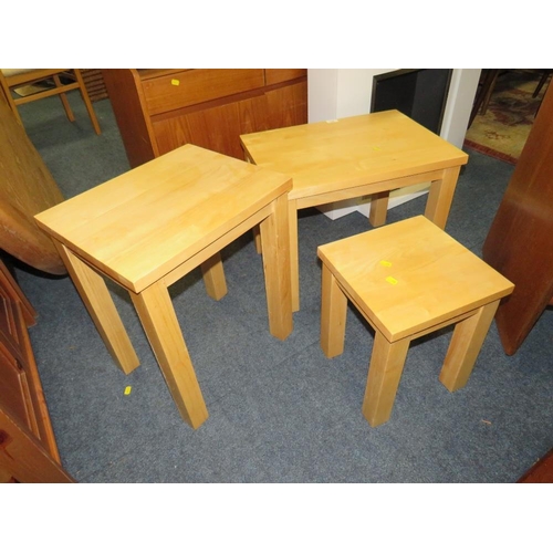 752 - A modern oak nest of three tables