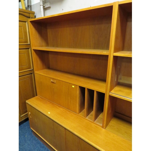 755 - A large teak mid-century wall display unit