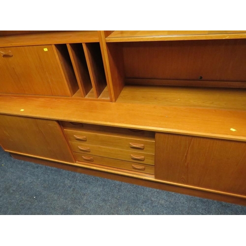 755 - A large teak mid-century wall display unit