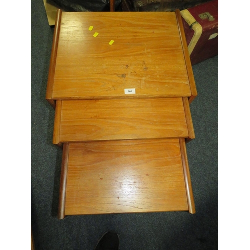 760 - A nest of mid-century teak tables with marked top