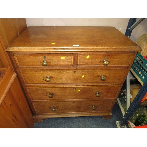 763 - A 19th century Oak cross banded five draw chest of drawers