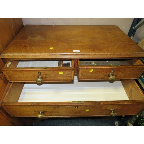 763 - A 19th century Oak cross banded five draw chest of drawers