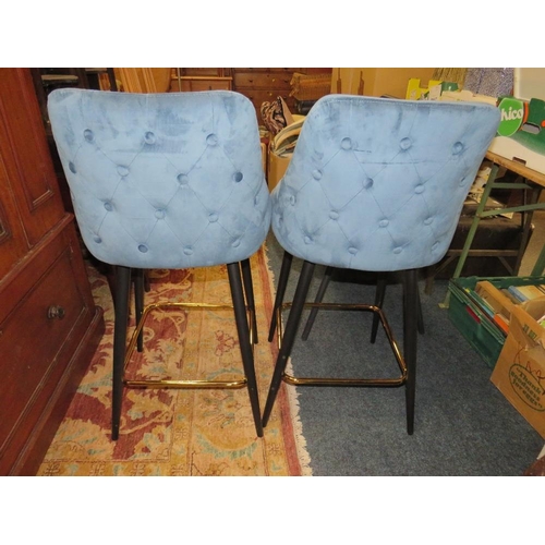 767 - A pair of modern upholstered kitchen / barstools