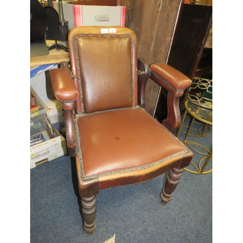 768 - A LATE VICTORIAN BARBERS / DENTISTS CHAIR, with upholstered mahogany frame, with reclining back rest... 