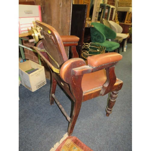 768 - A LATE VICTORIAN BARBERS / DENTISTS CHAIR, with upholstered mahogany frame, with reclining back rest... 