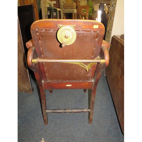 768 - A LATE VICTORIAN BARBERS / DENTISTS CHAIR, with upholstered mahogany frame, with reclining back rest... 