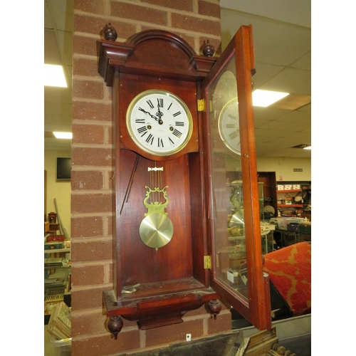 769 - An antique Vienna wall clock in need of restoration together is a modern G Ward &  sons wall clock