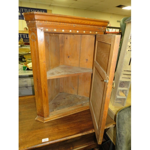 772 - AN ANTIQUE OAK HANGING CORNER CUPBOARD WITH MOTHER-OF-PEARL INLAY