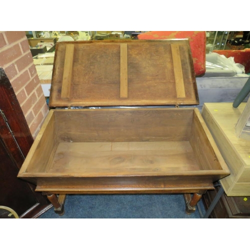 773 - An antique dough trough/bin on wooden stand