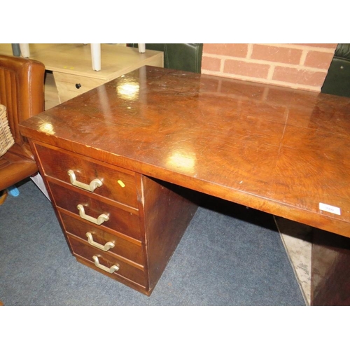 780 - A large Deco style pedestal desk with drawers to one side