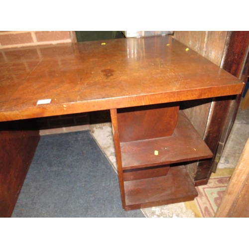 780 - A large Deco style pedestal desk with drawers to one side