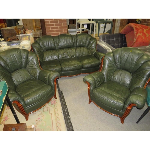 785 - A green leather, three piece lounge suite