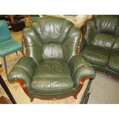 785 - A green leather, three piece lounge suite