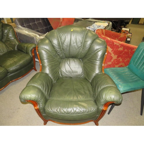 785 - A green leather, three piece lounge suite