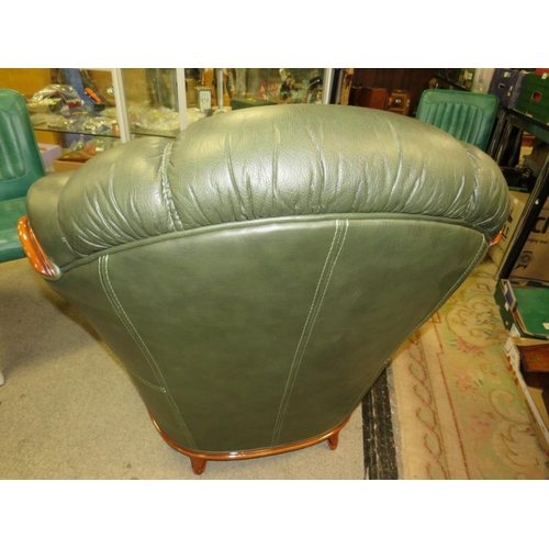 785 - A green leather, three piece lounge suite