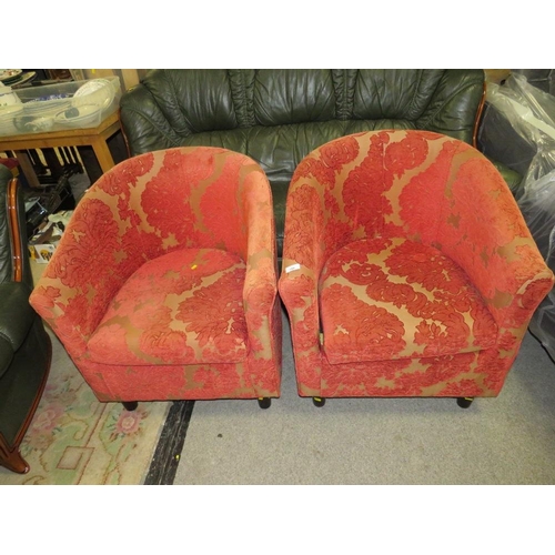 786 - A pair of modern red patterned upholstered tub style armchairs