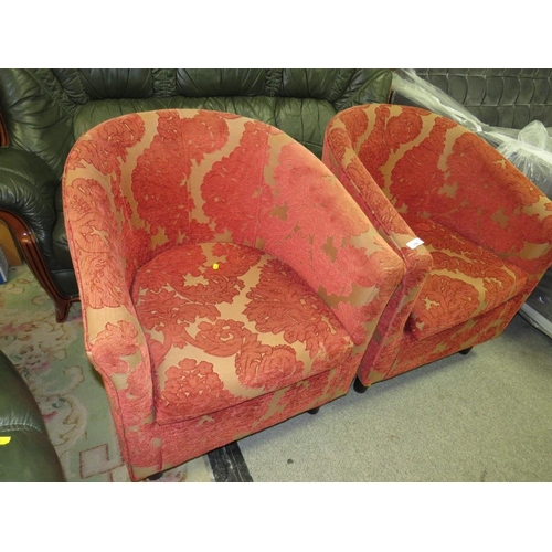 786 - A pair of modern red patterned upholstered tub style armchairs