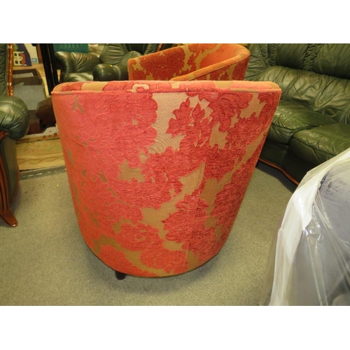 786 - A pair of modern red patterned upholstered tub style armchairs