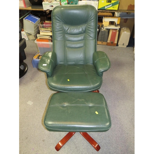 789 - A modern green Stressless style armchair and footstool